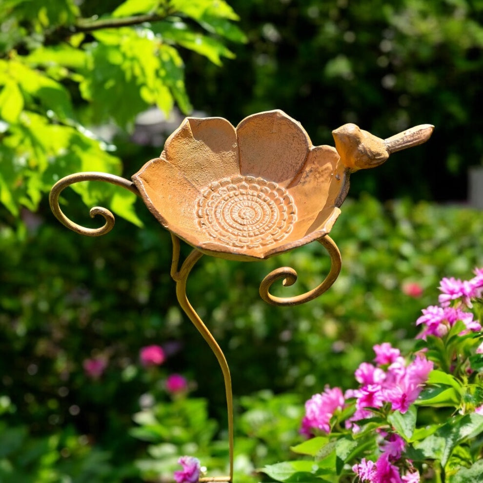 A cast iron bird bath from Fig and Rose Home.
