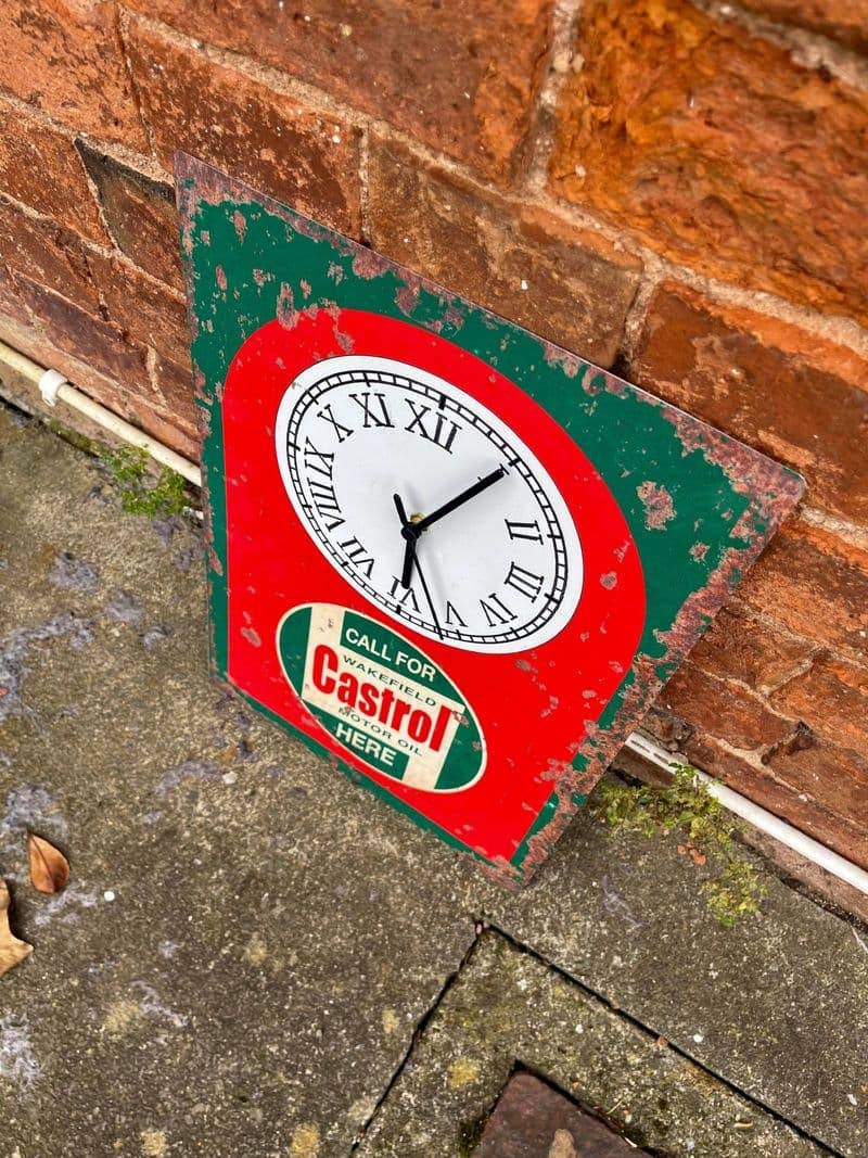 A Clock Castrol Metal Sign available to buy from Fig and Rose Home.