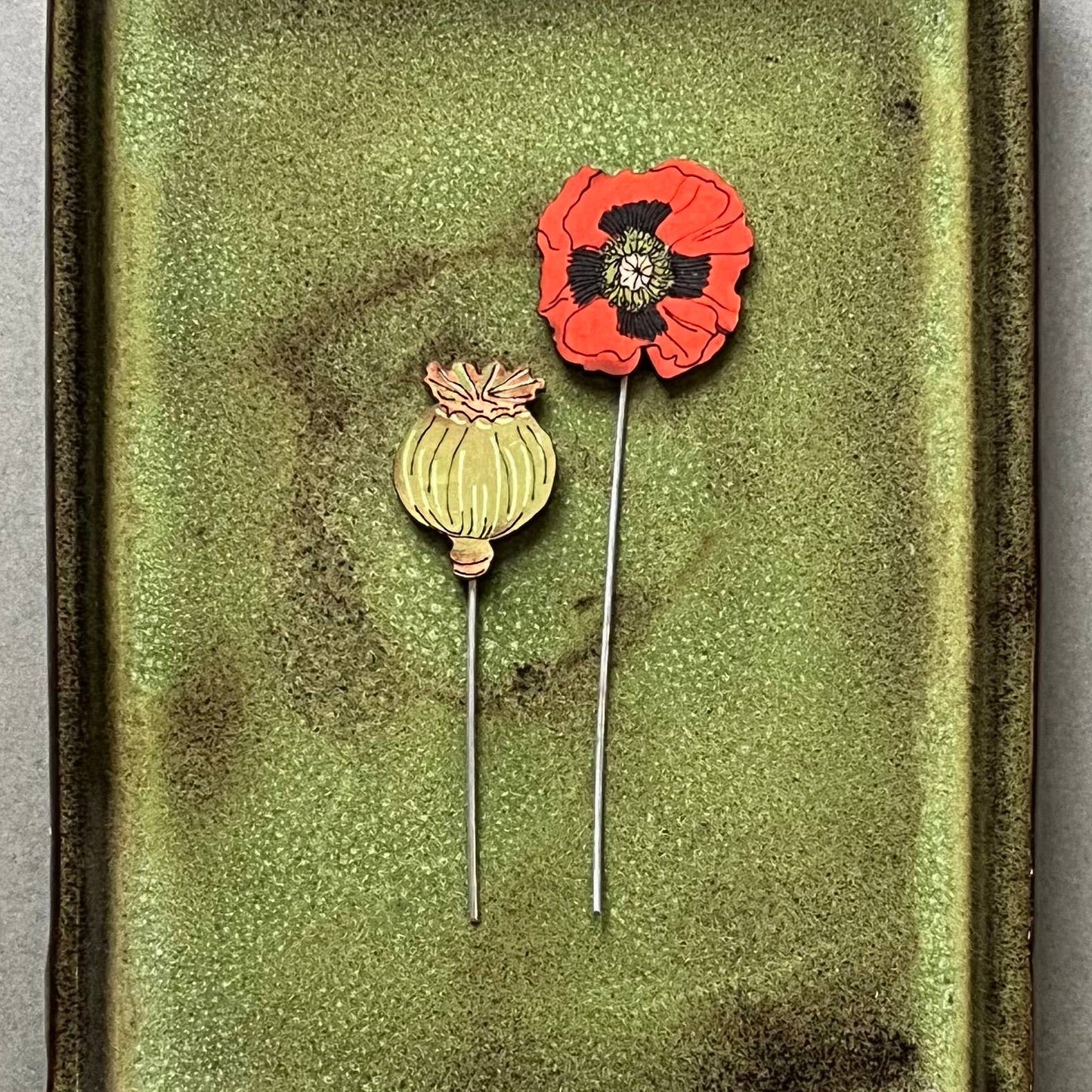 A Poppy Plant Pot Companions available to buy from Fig and Rose Home.