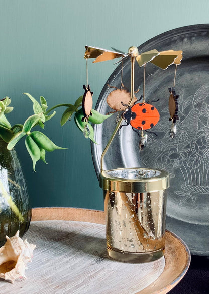 A Candle Carousel - Robin, Bee or Ladybird available to buy from Fig and Rose Home.