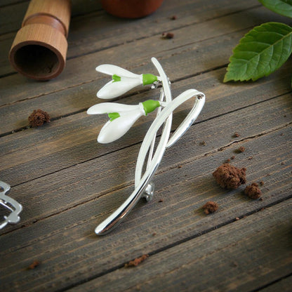 A Snowdrop Brooch available to buy from Fig and Rose Home.