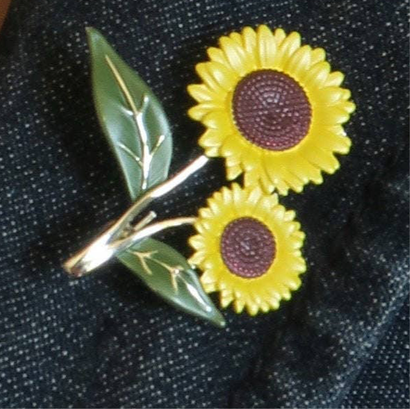 A Sunflower Pin Brooch available to buy from Fig and Rose Home.