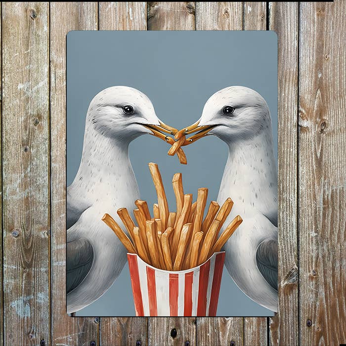A Seagulls Eating Chips Metal Sign available to buy from Fig and Rose Home.