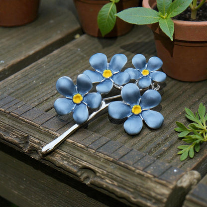 A Forget Me Not Brooch available to buy from Fig and Rose Home.
