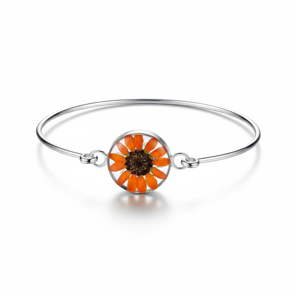 A Sunflower Silver Bangle available to buy from Fig and Rose Home.