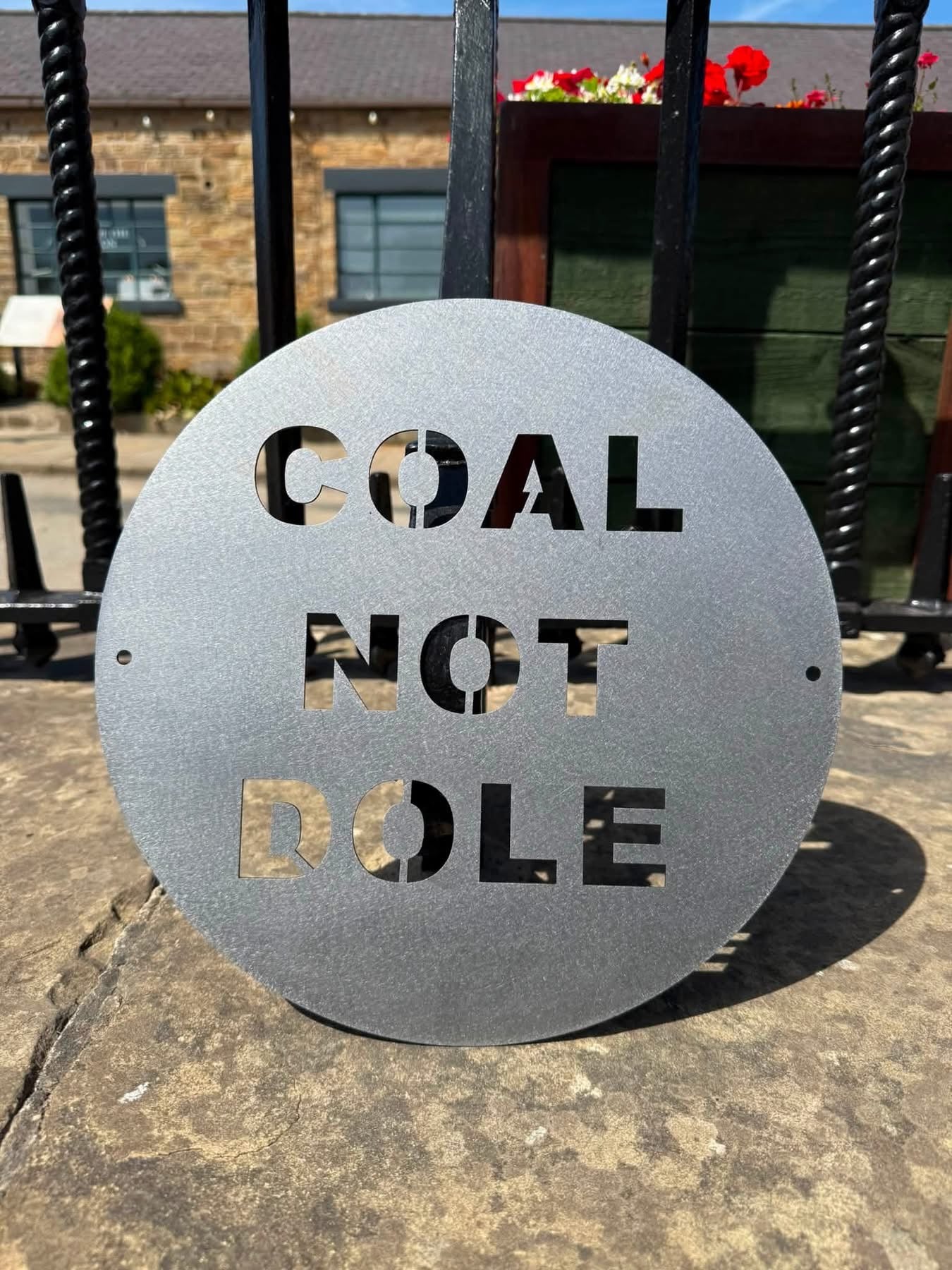 A coal not dole sign from Fig and Rose.