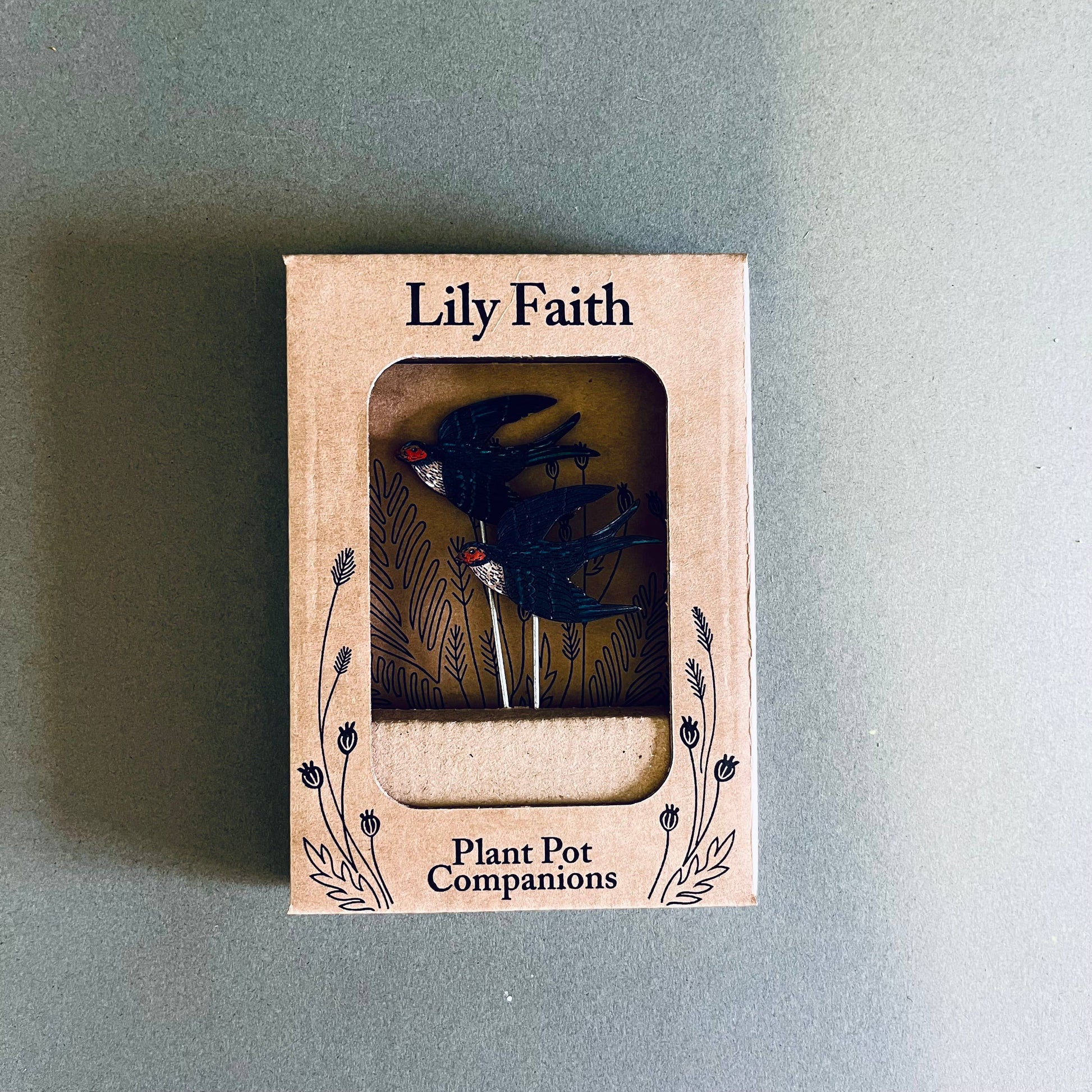 A Swallow Plant Pot Companions available to buy from Fig and Rose Home.